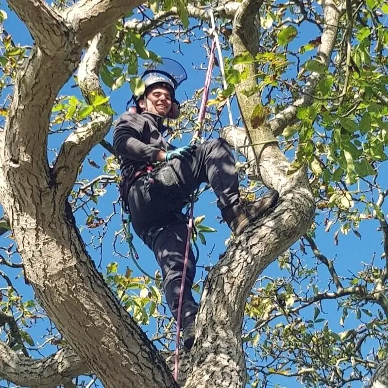 Climber smiling from the crown